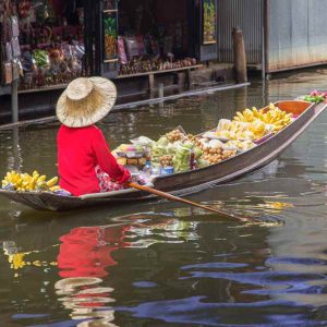Discover the heart of Thailand on our Floating Market Tour, followed by a serene visit to a Traditional Thai House
