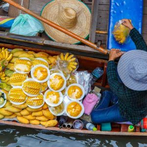 Dive into a world of vibrant colors and flavors with our Floating Market Tour and Traditional Thai House experience