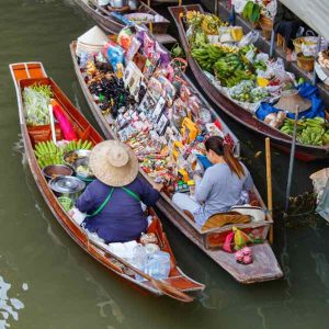 Experience the authentic Thai lifestyle on our Floating Market Tour and step back in time at a Traditional Thai House